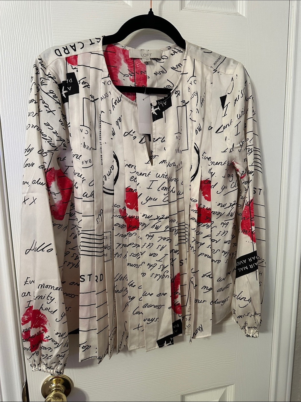 LOFT Cream Blouse with Red Script and Black Accents